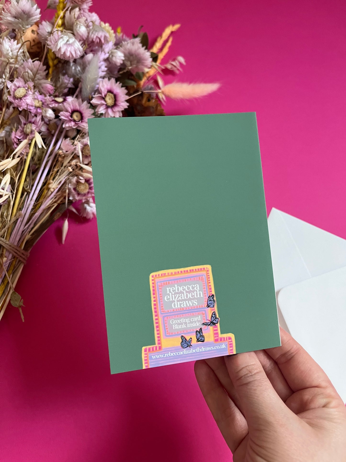 Cat illustrations in a collection on a colourful pink background and a dark green back. Alongside the Rebecca Elizabeth draws logo.