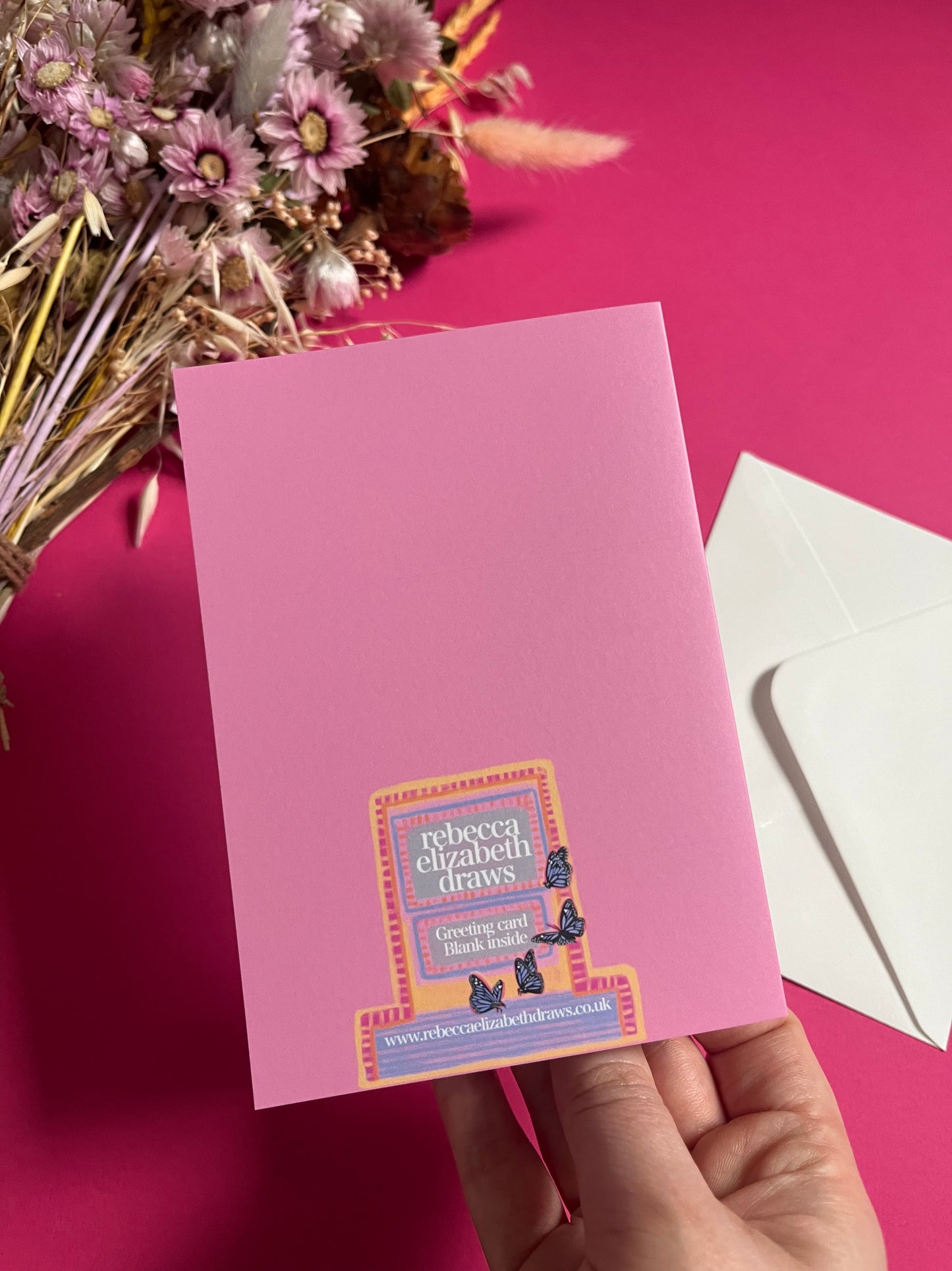 Hand drawn illustration of dogs, from whippets, lurchers, Labradors and Yorkshire terriers and much more. All drawn in a collection on a pink background with blue vertical stripes. An orange horizontal stripe along the top & bottom. The back is pink with the Rebecca Elizabeth Draws logo.