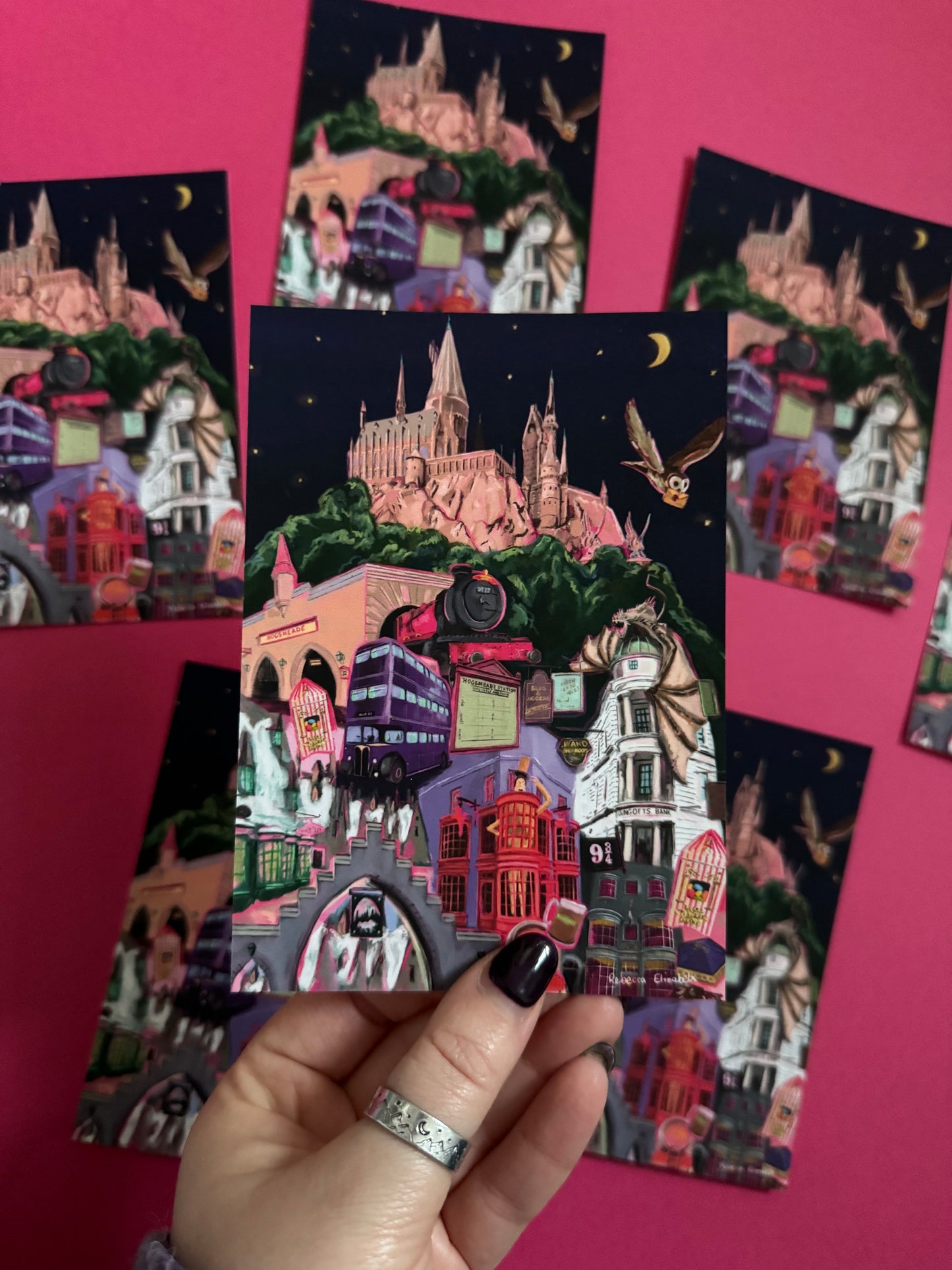 Illustrated postcard inspired by the Wizarding World of Harry Potter in Orlando Florida, with Hogwarts, Hogsmeade, Hogwarts express, an owl, Ollivanders, Gringotts, the knight bus & much more. This print is for all the Potterhead’s designed by Rebecca Elizabeth draws.