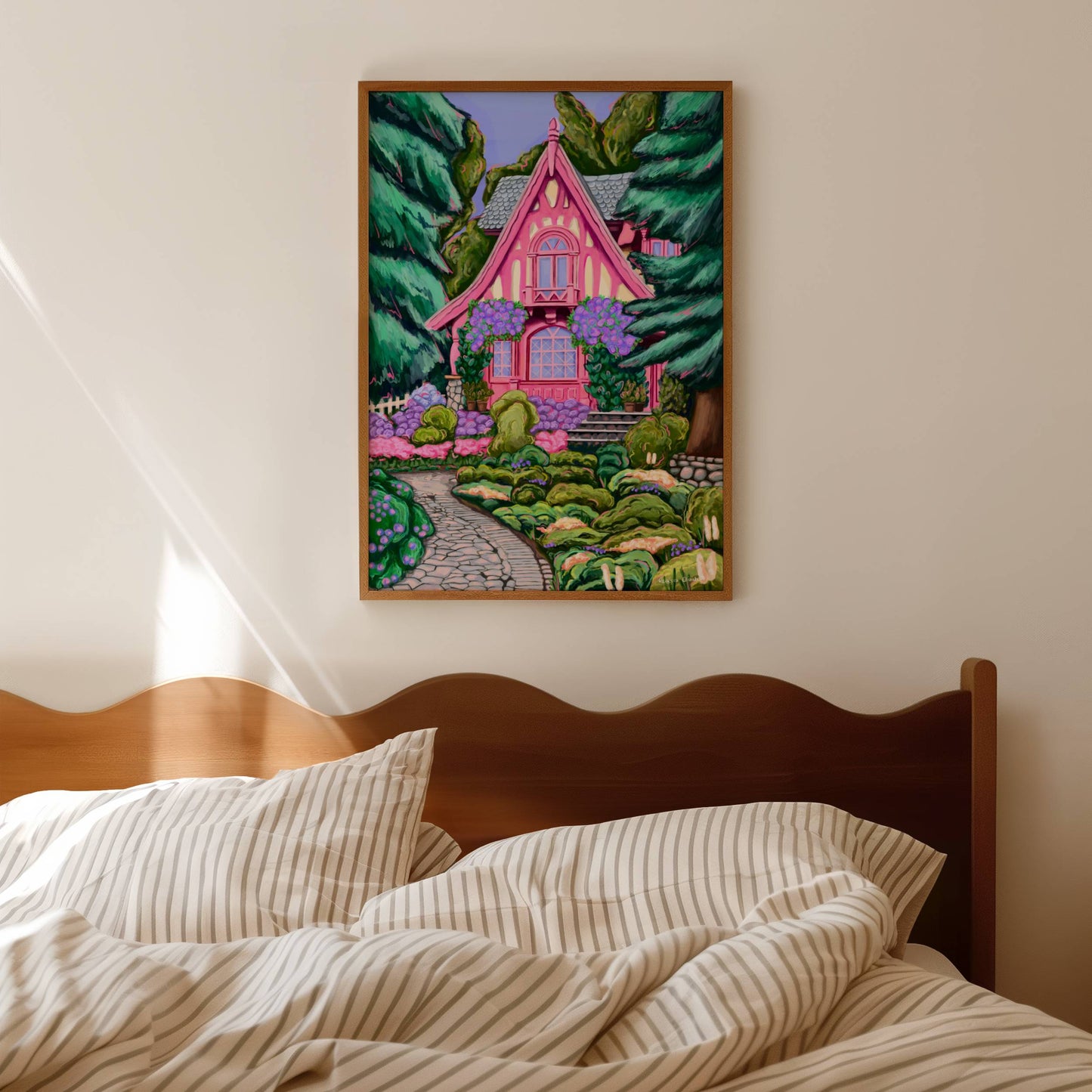 Pink cottage illustration with big bunches of hanging violet & lilac flowers. Plant pots fill the porch & the home is surrounded by nature, with big trees, green bushes & lots of pretty flowers. A soft whimsical fairy tale inspired art.