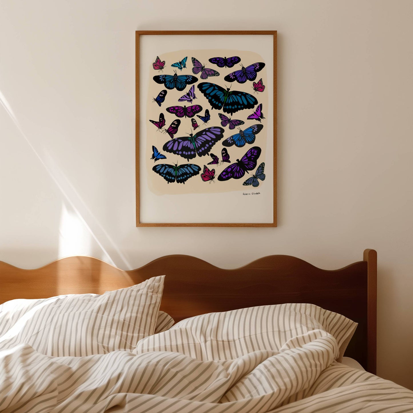 A collection of butterflies and moths hand painted in gouache in blues and purples and black. Then edited digitally into a collaged design on a cream background and a small signature underneath. Designed by Rebecca Gibbs at Rebecca Elizabeth Draws.