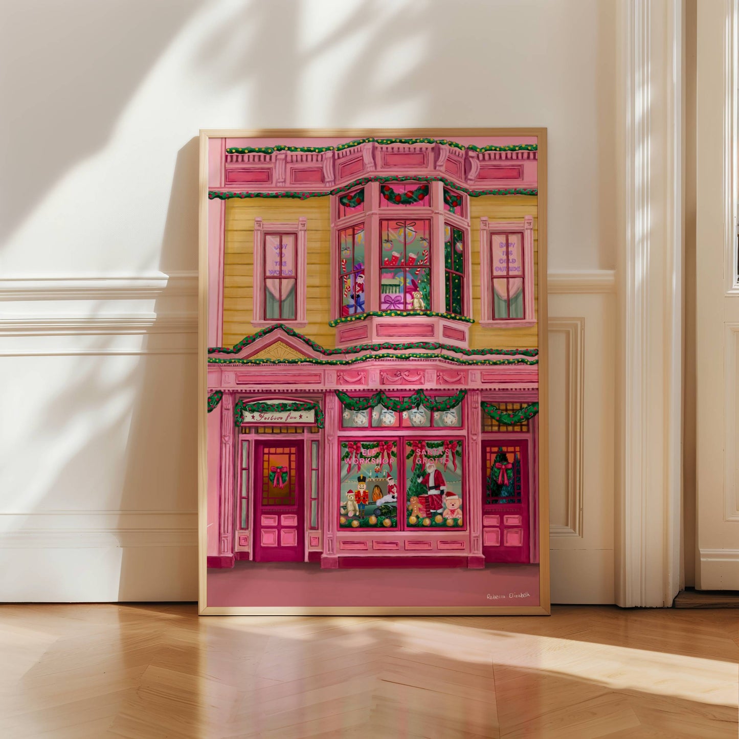 Colourful pink & mustard yellow Christmas shop front. With wreaths, baubles, trees & more. This festive illustration is inspired by all things kitsch, cute & fun. Designed by Rebecca Elizabeth Draws.
