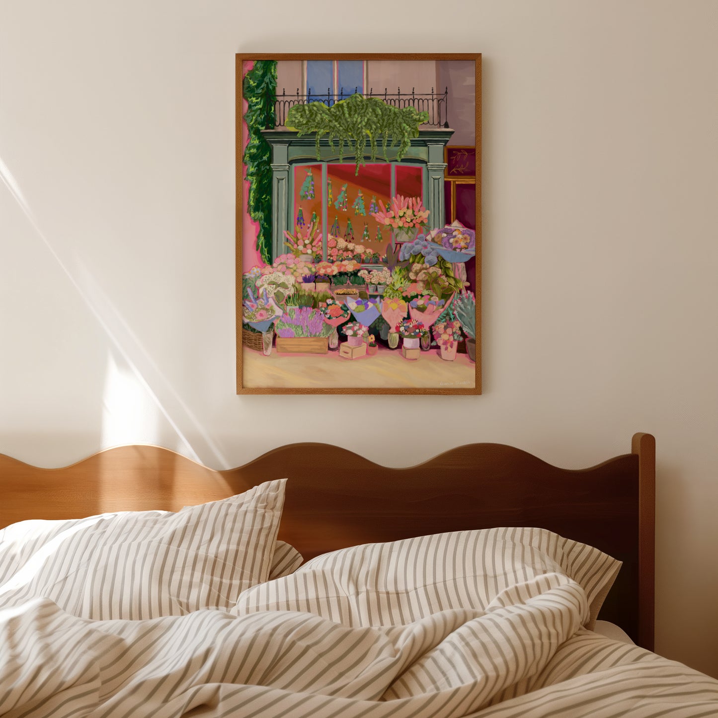 Illustration of a beautiful flower shop, the window shows the flowers drying inside and outside there are rows of bunches of flowers and pots of plants. This illustration is soft brown and pink with bright highlights throughout.
