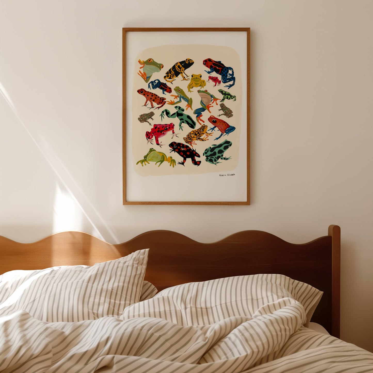 A collection of vibrant froggies to bring a pop of colour to your life. Hand painted rainforest frogs in gouache and edited digitally into a collaged design on a cream background and a small signature underneath. Designed by Rebecca Gibbs at Rebecca Elizabeth Draws.