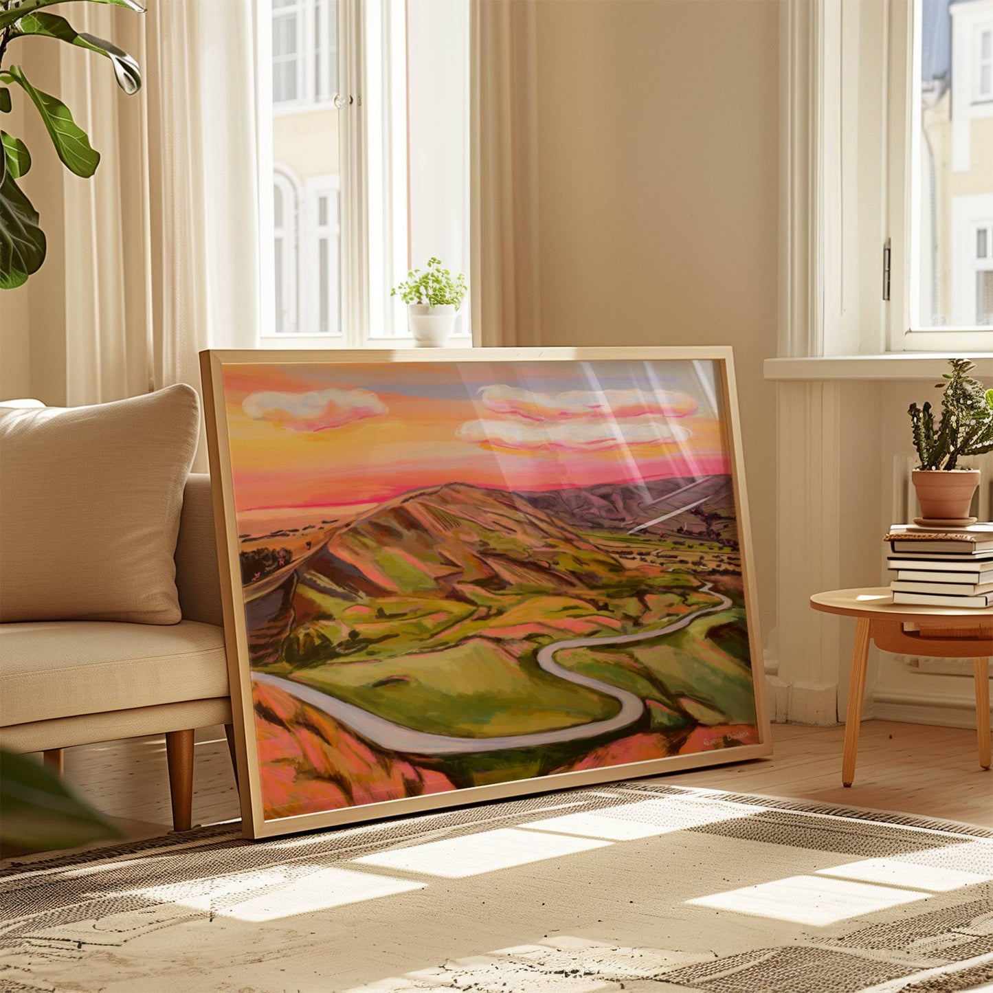Illustration of mam tor hill in Castleton Derbyshire the peak district. Views across the hill and further on into the hope valley and Edale can be seen. A winding road in the foreground and a setting sun sky in pinks, yellow and blue.