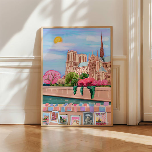 colourful illustration of Notre Dame in Paris, France. With spring pink cherry blossom trees, a sun in the sky and the river seine in front. Along the riverside is small stalls selling art, featuring other Rebecca Elizabeth Draws illustrations.
