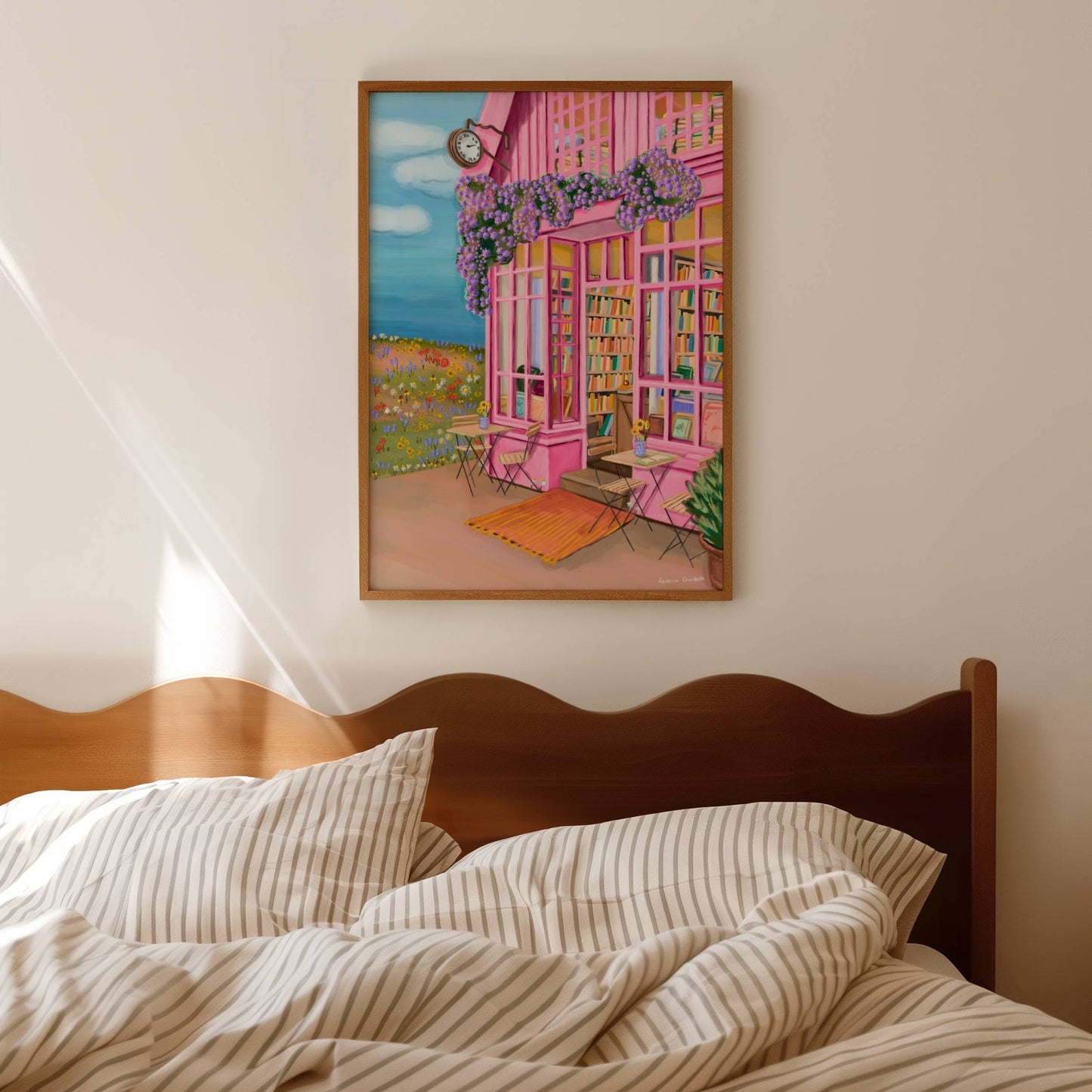 whimsical soft pink bookshop in the countryside, a field of wildflowers to the left with daisies and yellow flowers. a blue sky full of clouds, lilac purple flowers grow over the building of the book store and soft coloured books inside.