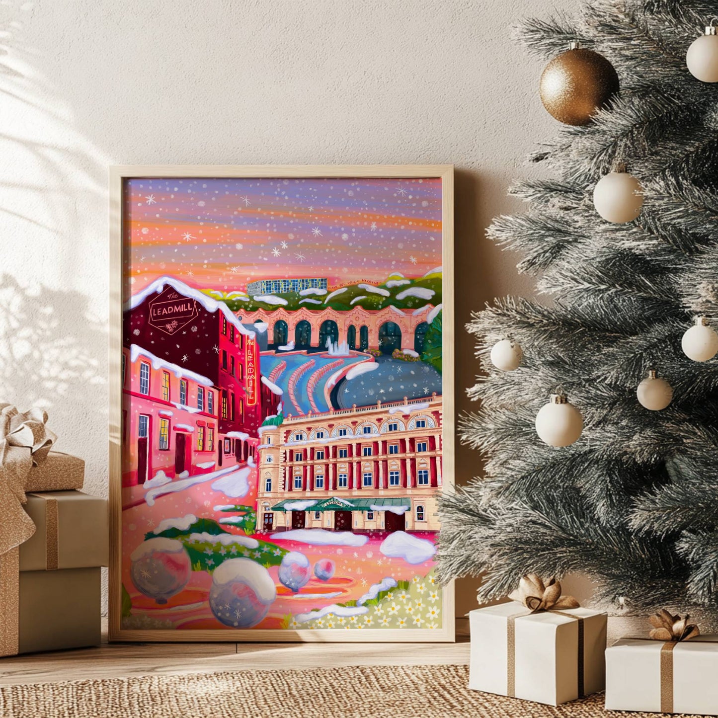 An illustration of Sheffield city in winter with snow. Featuring The Leadmill, the Lyceum, Sheffield train station, Sheffield Park Hill flats, park hill graffiti and water features. This illustration is very vibrant with bright pinks and oranges, the places featured are collaged together against a purple and orange sky. There is a small signature in white the corner. Designed by Rebecca Gibbs at Rebecca Elizabeth Draws.