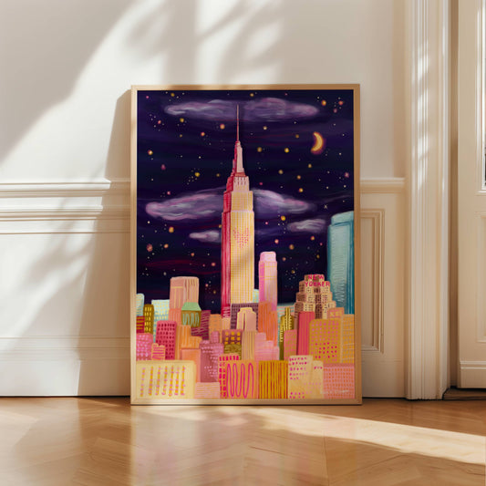 New York city skyline with the empire state building in the centre with love heart lights from the film sleepless in seattle with Meg Ryan & Tom Hanks. An evening night sky with stars sparkling, skyscraper buildings in the front in shades of pink & orange.