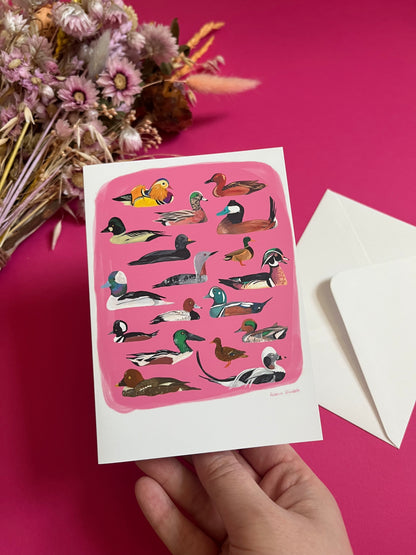 A collection of ducks and birds, hand painted in gouache and then edited digitally into a collaged design on a pink background with the Rebecca Elizabeth Draws logo on the back.