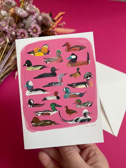 A collection of ducks and birds, hand painted in gouache and then edited digitally into a collaged design on a pink background with the Rebecca Elizabeth Draws logo on the back.