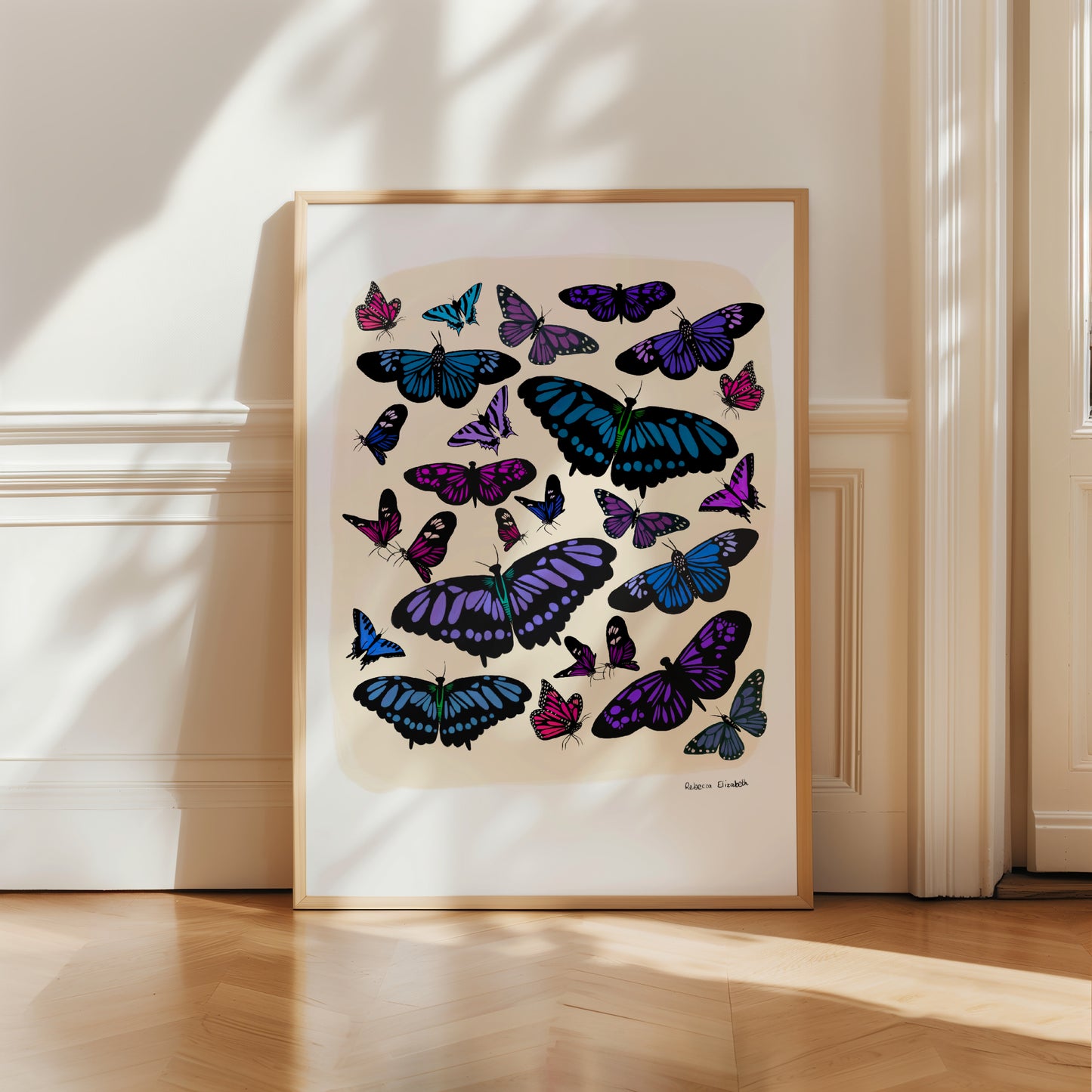 A collection of butterflies and moths hand painted in gouache in blues and purples and black. Then edited digitally into a collaged design on a cream background and a small signature underneath. Designed by Rebecca Gibbs at Rebecca Elizabeth Draws.