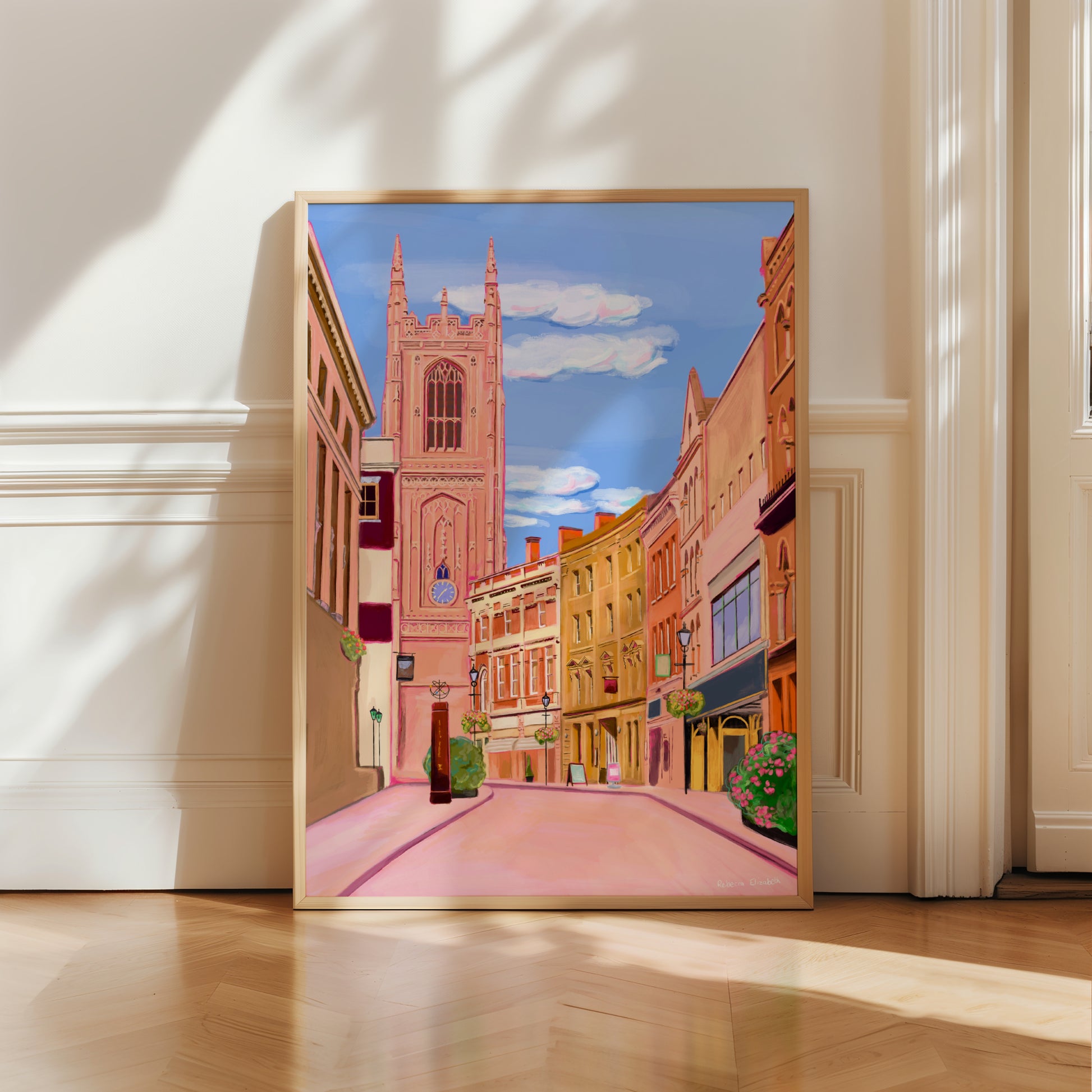 Illustration of Irongate in derby with a view at the cathedral down the street of shops. Drawn in retro colours yellow, pink, orange & blue with a soft whimsy style and vintage elements by Rebecca Elizabeth Draws.