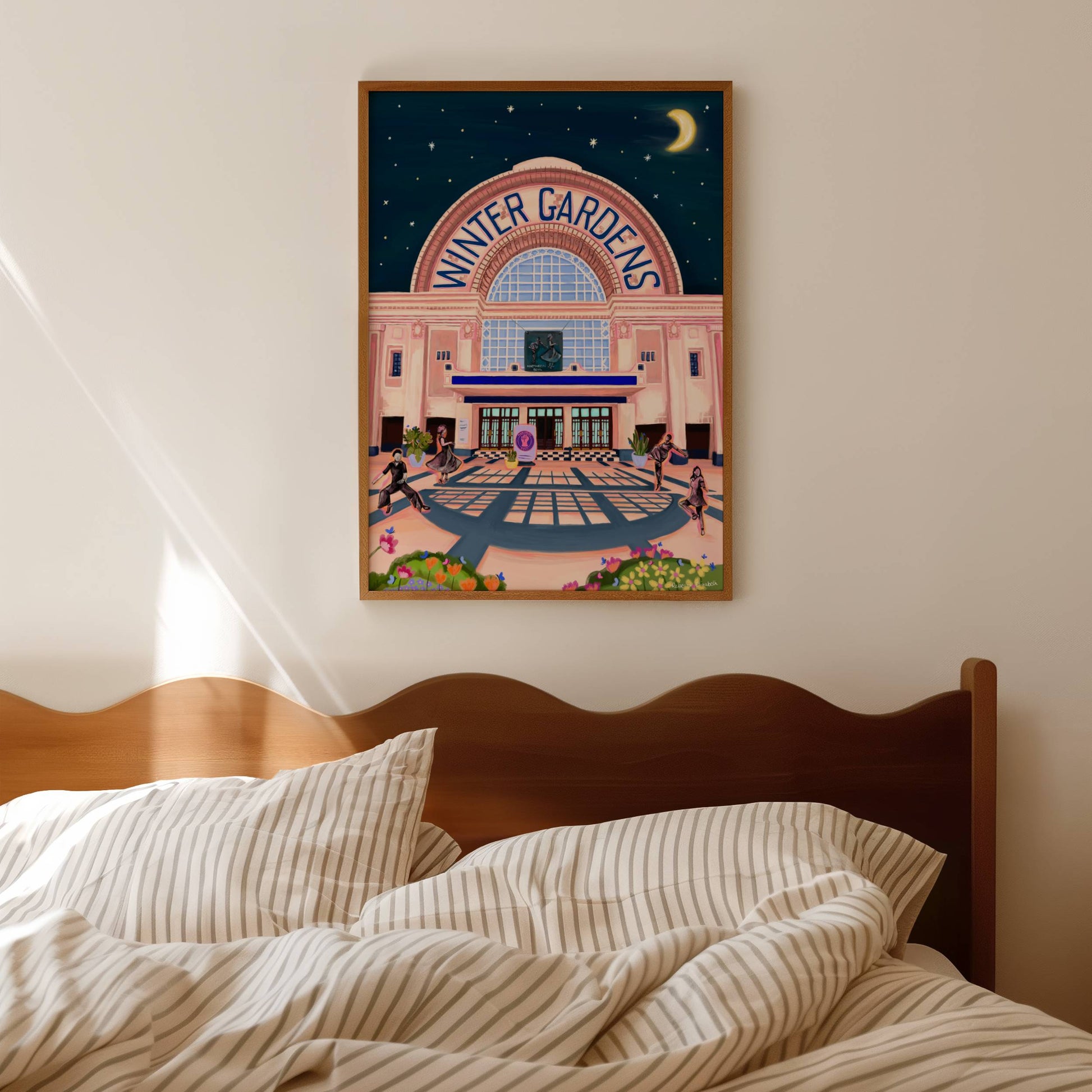 Winter gardens, Blackpool. This illustration is inspired by Northern Soul dance with vibrant dancing figures in the foreground, silhouetted in black and bright orange and pink behind. The winter gardens building is behind illustrated in soft pink and light orange colours and then there are flower and plants in the foreground. It is set to a dark blue night sky with stars and the moon. There is a small signature in white the corner.  Designed by Rebecca Gibbs at Rebecca Elizabeth Draws.