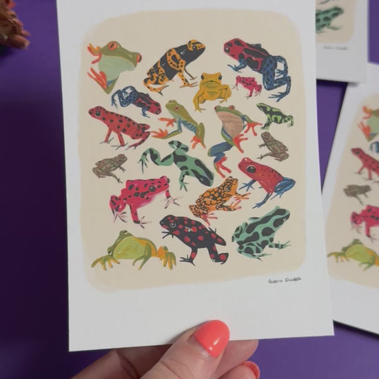 A collection of vibrant froggies to bring a pop of colour to your life. Hand painted rainforest frogs in gouache and edited digitally into a collaged design on a cream background and a small signature underneath. Designed by Rebecca Gibbs at Rebecca Elizabeth Draws.