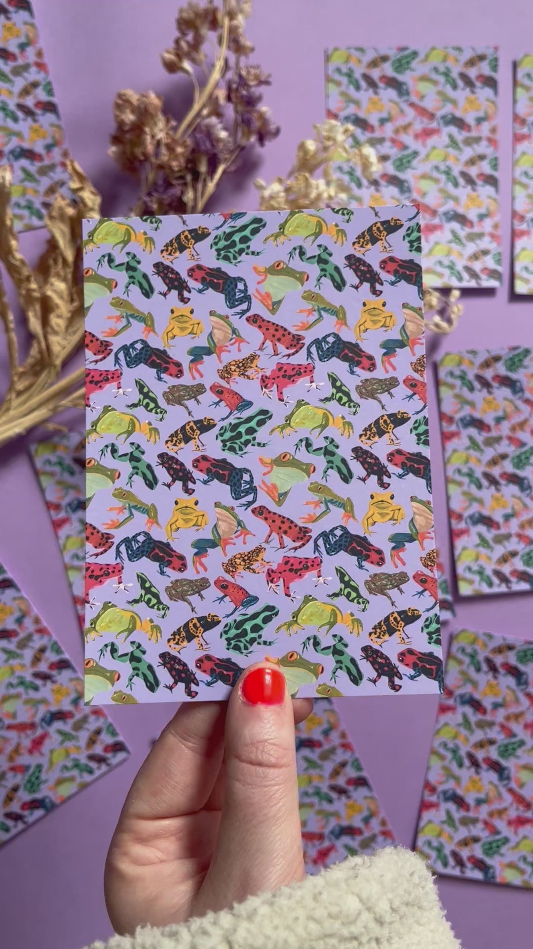 A pattern of vibrant froggies to bring a pop of colour to your life. Hand painted rainforest frogs in gouache and edited digitally into a pattern on a purple background. Now available in a cute postcard.