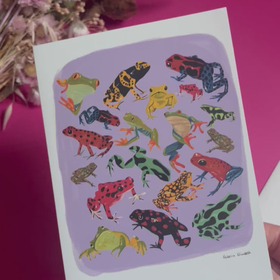 A collection of vibrant froggies to bring a pop of colour to your life. Hand painted rainforest frogs in gouache and edited digitally into a collaged design on a purple background with a pink back and the  Rebecca Elizabeth Draws logo.