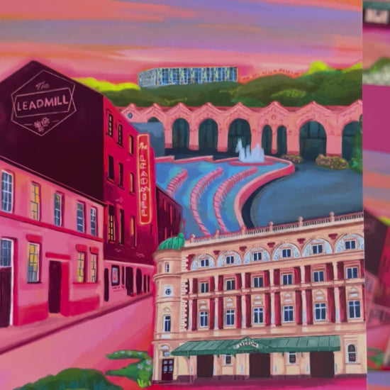 video of Postcard of an illustration of the Sheffield city with The Lyceum theatre, The Leadmill venue, the train station, park hill flats & graffiti. Designed by Rebecca Elizabeth Draws. Vibrant pinks, purples and oranges are featured. 